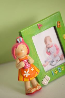 Immagine di Baby Girl con portafoto in poliresina,
cm13xh.11
