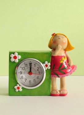 Immagine di Baby Girl con orologio in poliresina,
cm12.5xh.11
